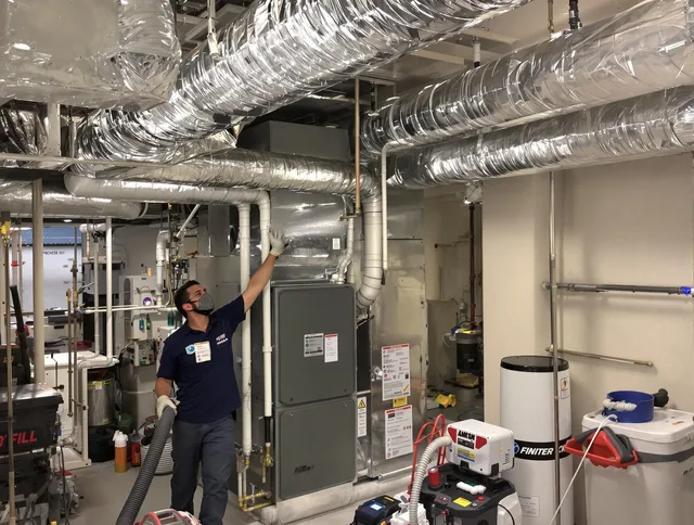Northborough Air Duct Cleaning specialist performing thorough furnace duct cleaning in a Northborough residence